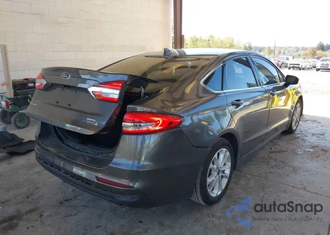 2019 Ford Fusion Hybrid Sel z USA, uszkodzony, nr VIN 3FA6P0MU6KR221159